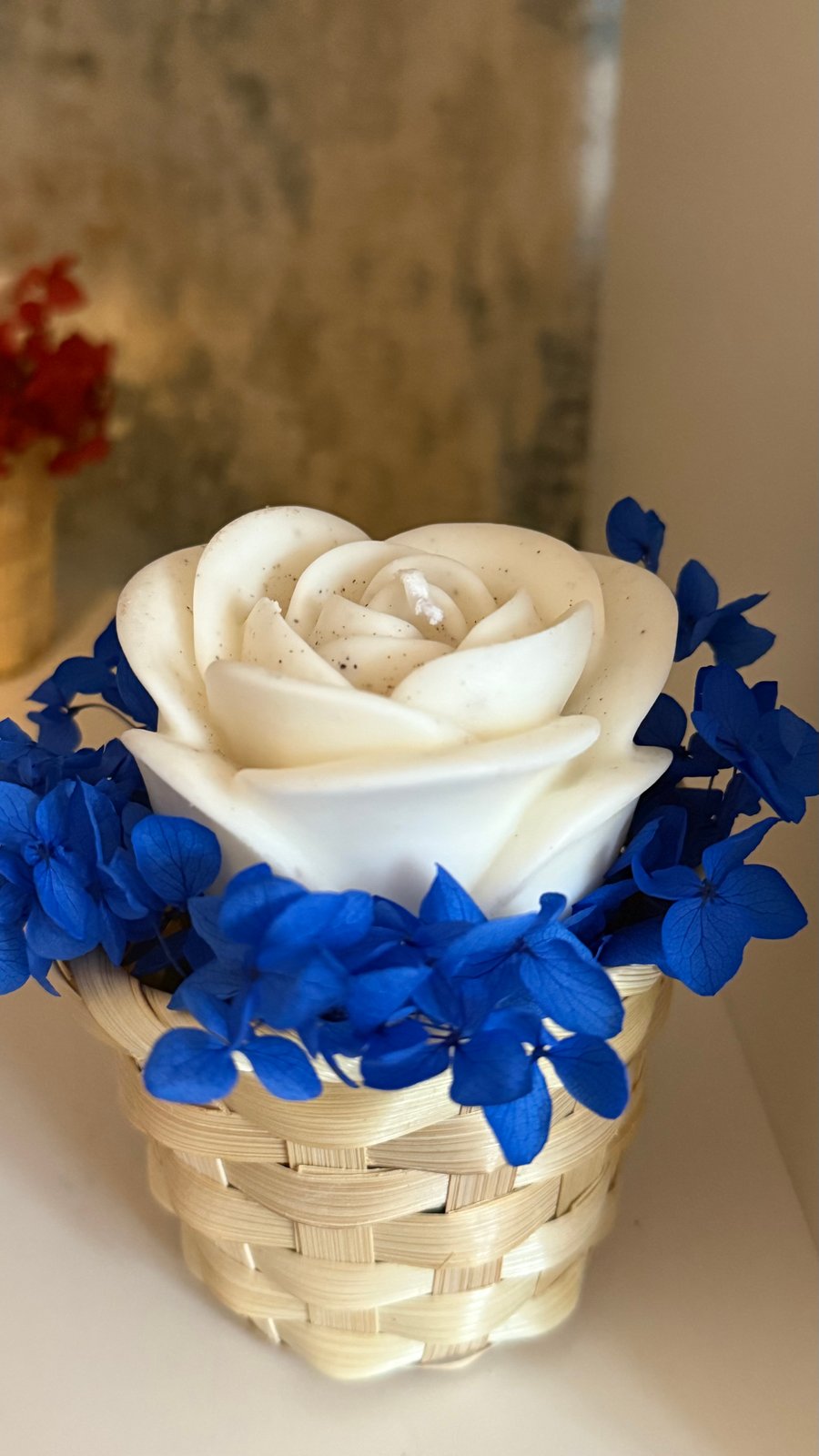 Rose candle flower in the basket