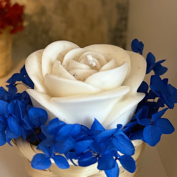 Rose candle flower in the basket