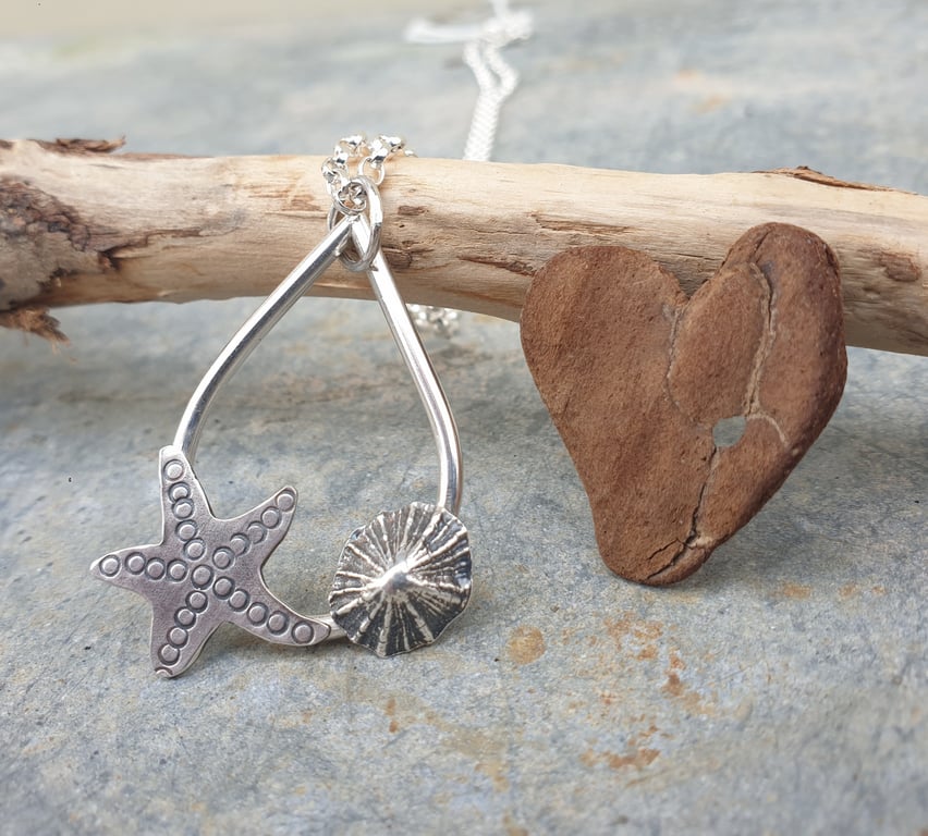 Silver teardrop rockpool beach pendant with starfish and limpet shell