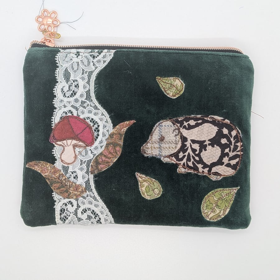 Green velvet zipped pouch with Hedgehog and toadstool in sari silk