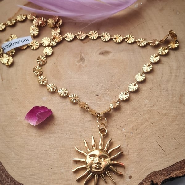 Surgical steel necklace with sun charms