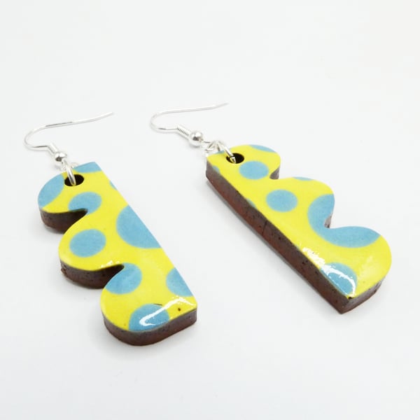 Ceramic earrings in yellow and blue polka dots
