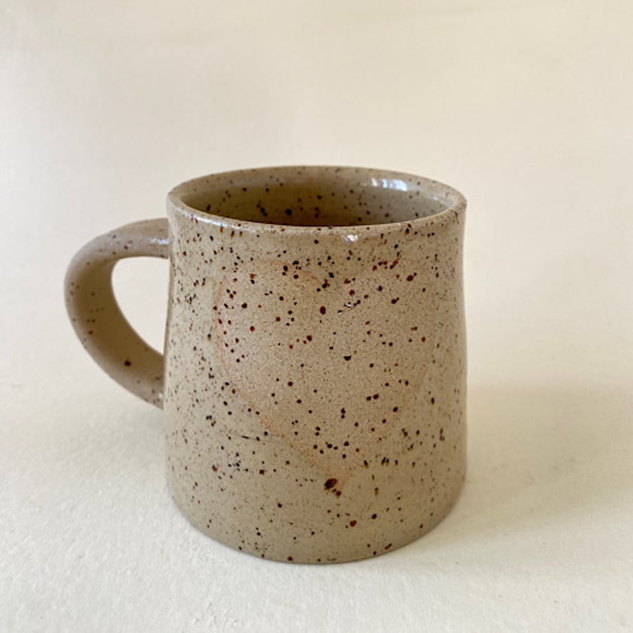 Love heart relief speckled clay cup.