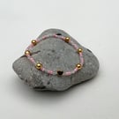 Beaded bracelet stackable pink glass gold