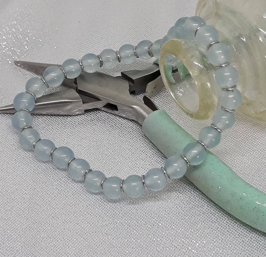 BR248 Aquamarine beaded elasticated bracelet