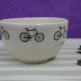 Small porcelain bowl with bicycle motifs