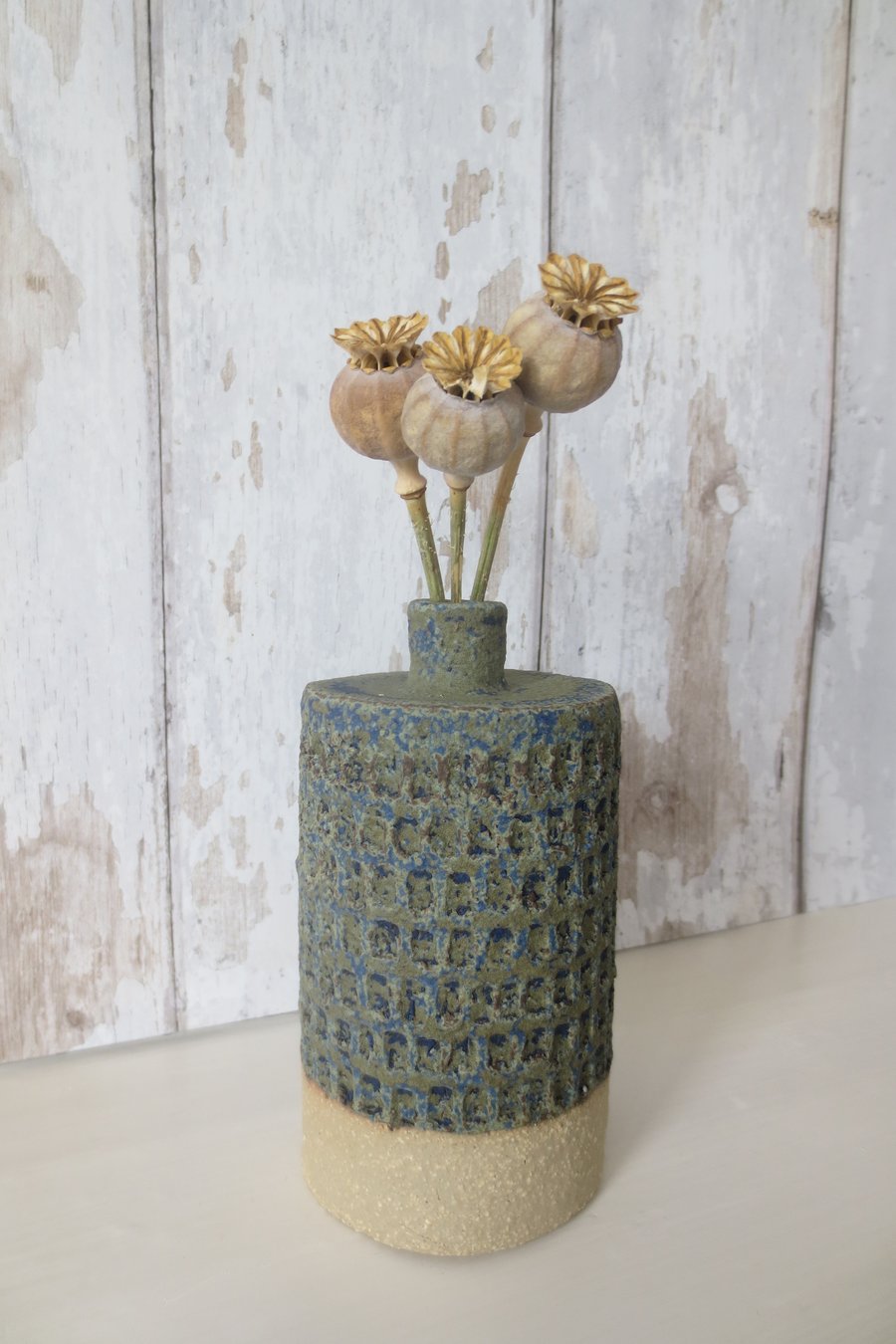 Hand-built stoneware pottery textured vase in deep blue-green