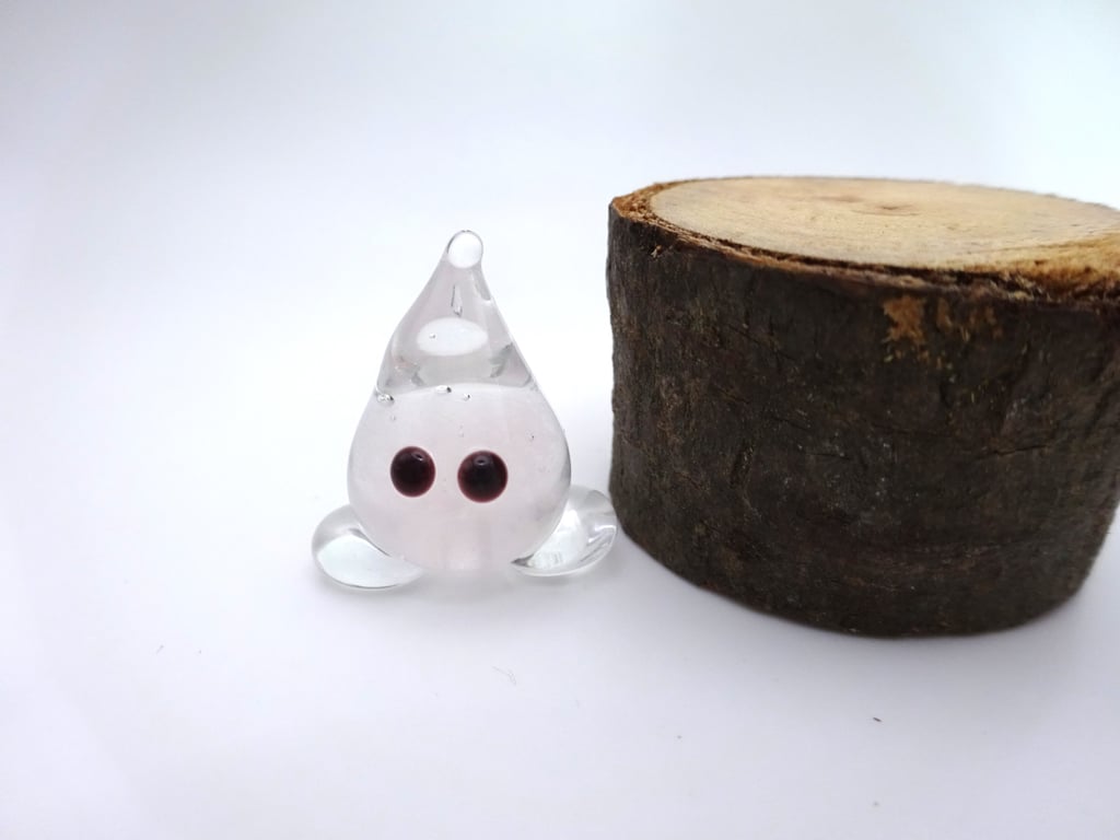 small glass wisp figure