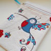 embroidered hummingbird gadget case