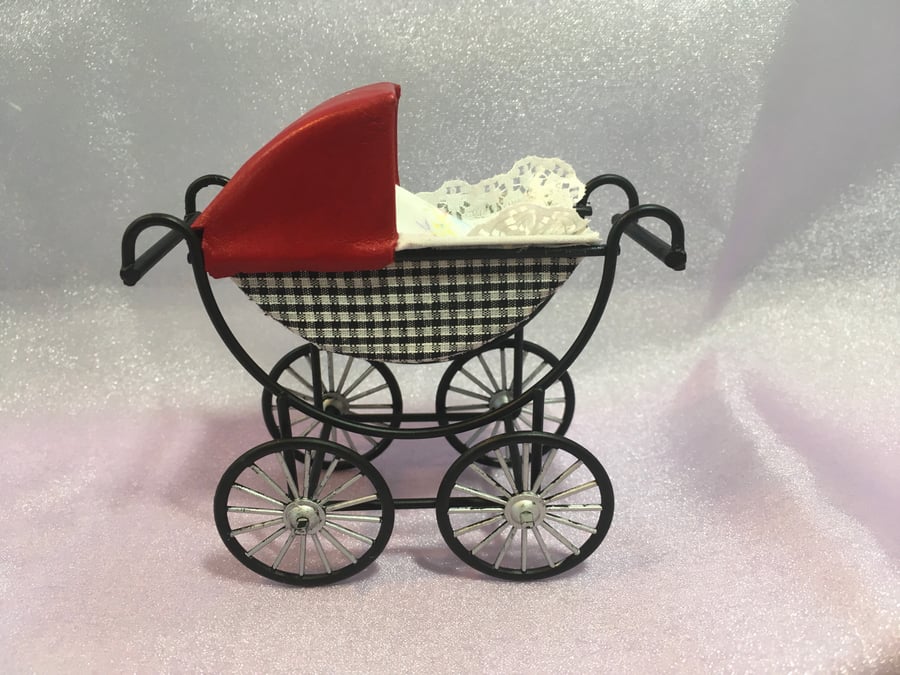 A Coachbuilt Pram for The Baby of the Family in a Collector’s Dolls House & BABY