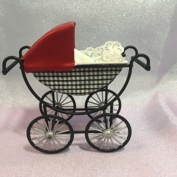 A Coachbuilt Pram for The Baby of the Family in a Collector’s Dolls House & BABY
