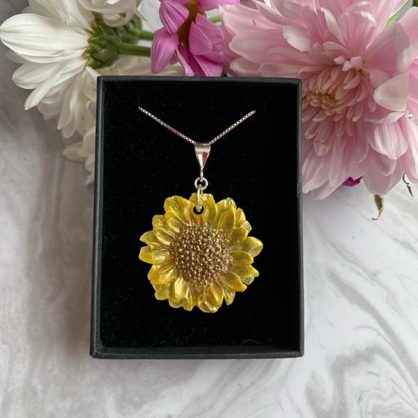 Sunflower handpainted pendant with a sterling silver 18 inch chain.