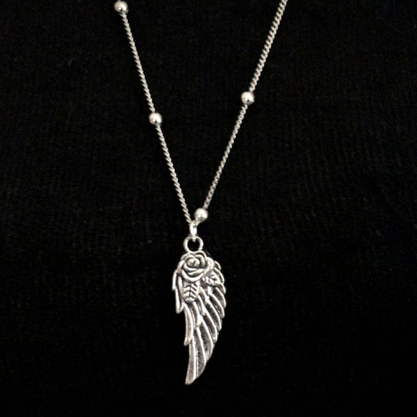 Long angel wing charm necklace