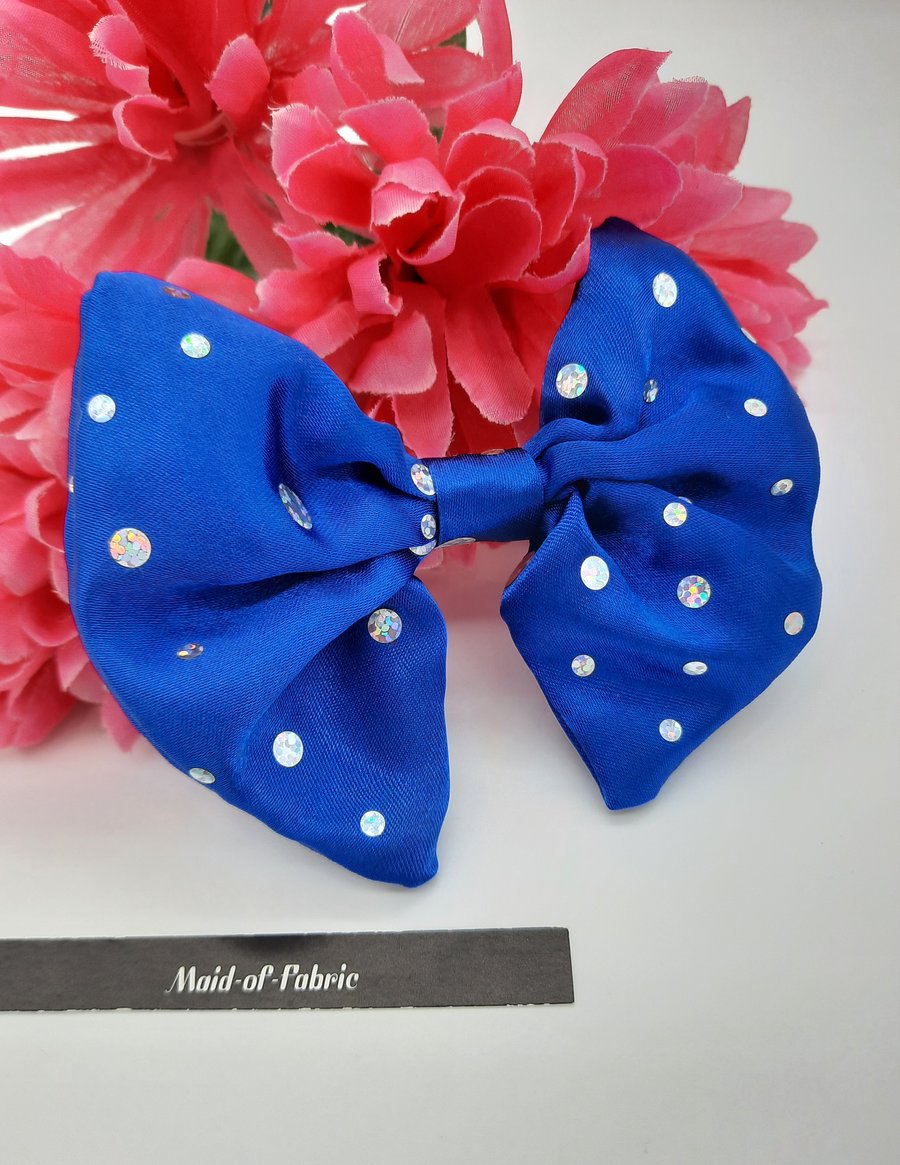 Hair bow slide clip in blue hologram sparkles. 3 for 2 offer.  