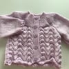 Lacy cardigan with a moss stitch yoke