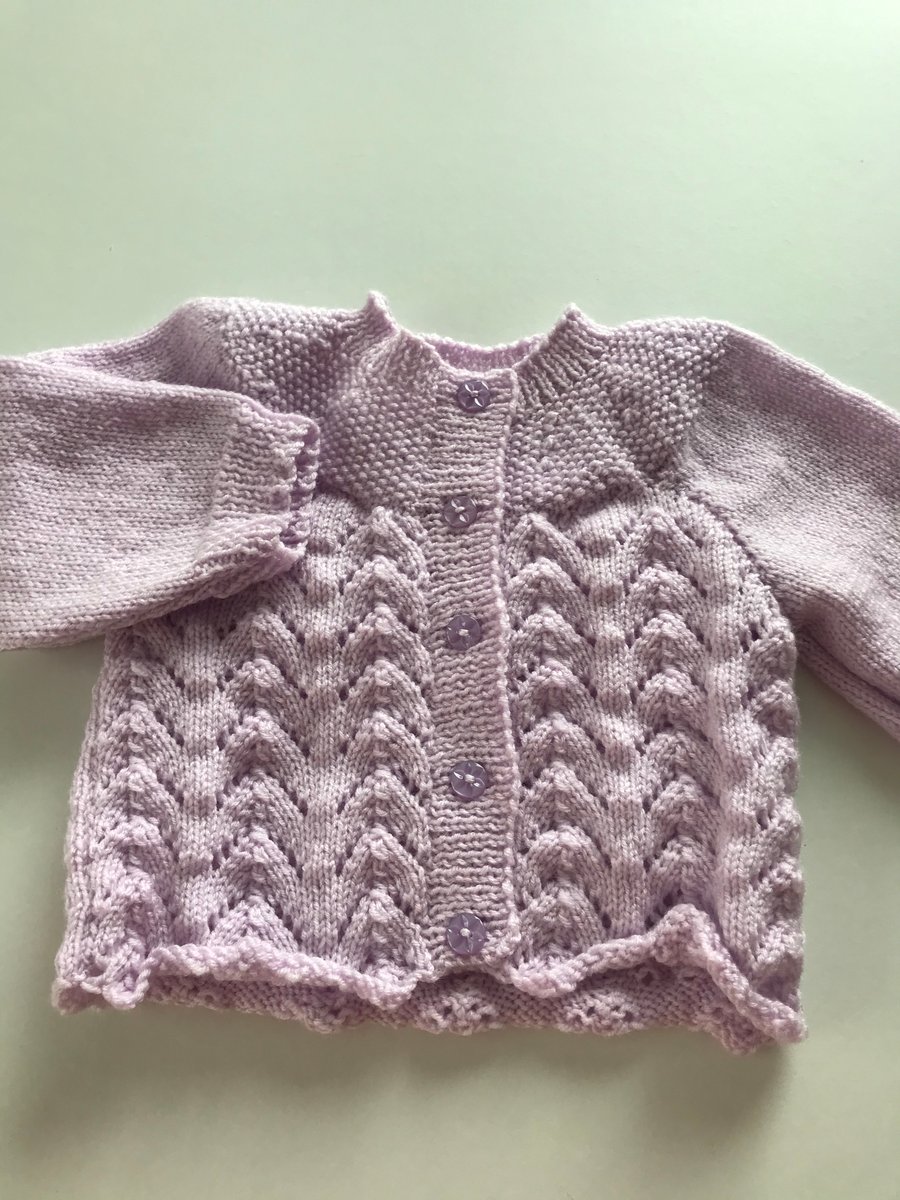 Lacy cardigan with a moss stitch yoke
