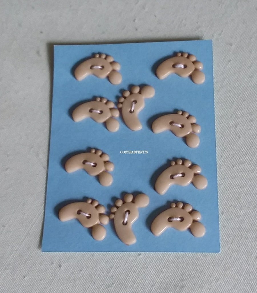 BEIGE FEET SHAPED BUTTONS WITH TWO HOLES FOR ATTACHING 