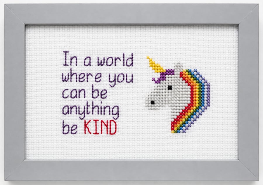 Framed unicorn picture in cross stitch