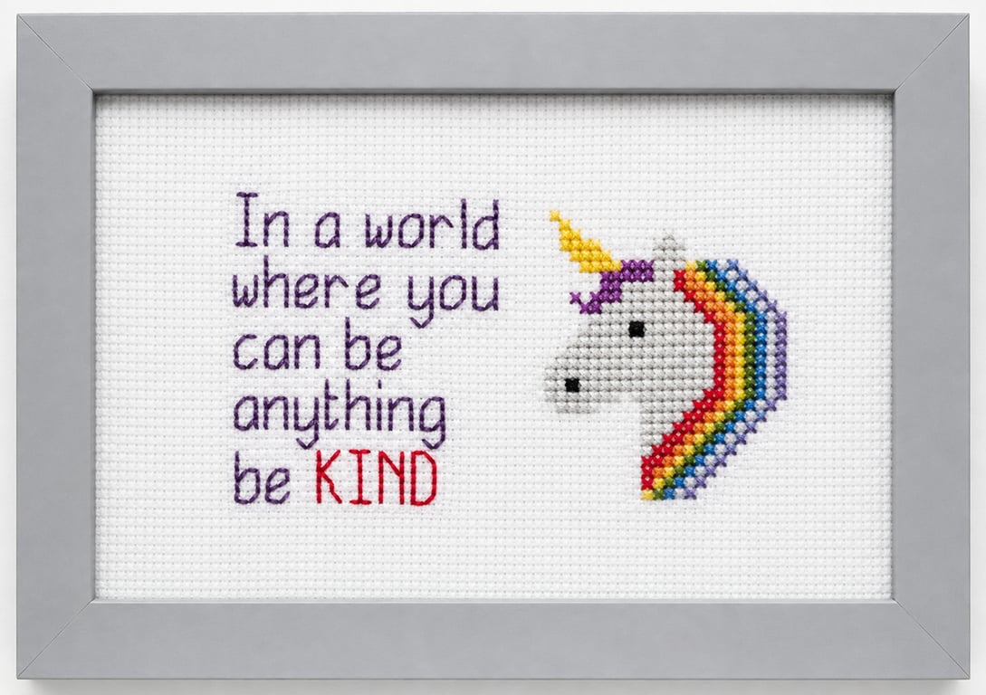 Framed unicorn picture in cross stitch