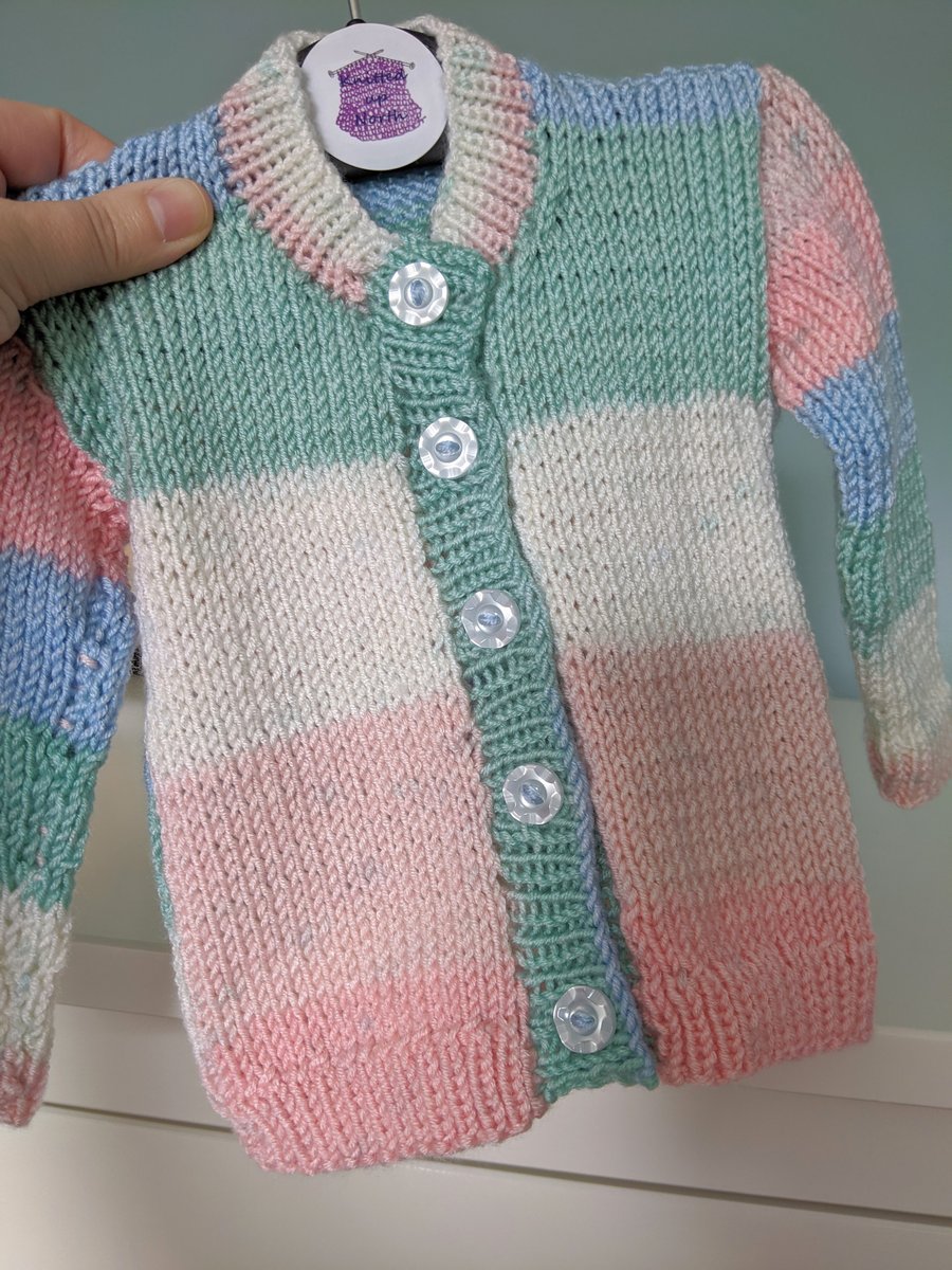 Hand-knitted baby cardigan in pastel stripes