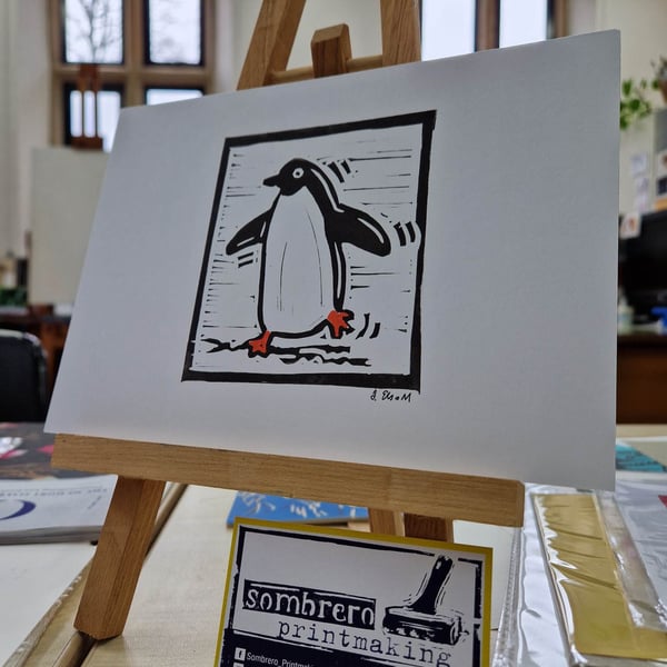Wiggly penguin A5 lino print. Sombrero Printmaking