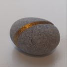 Handcarved and gilded ring pebble