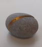 Handcarved and gilded ring pebble