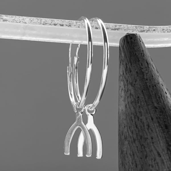 Hoop earrings with wishbone charm, pair.