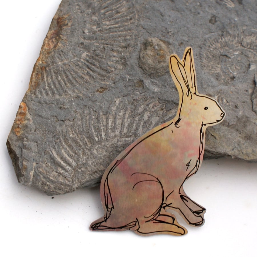 Golden hare brooch