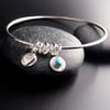 Sterling Silver Bangle with Heart Charms and Turquoise