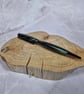Hand Turned Kirinite Twist Pen - Green Swirl with Gun Metal Plating - Image 1