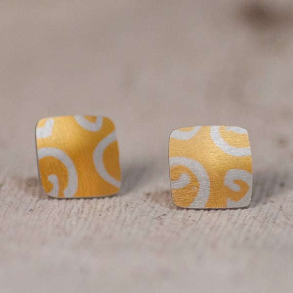 Orange, gold coloured, Batik inspired studs