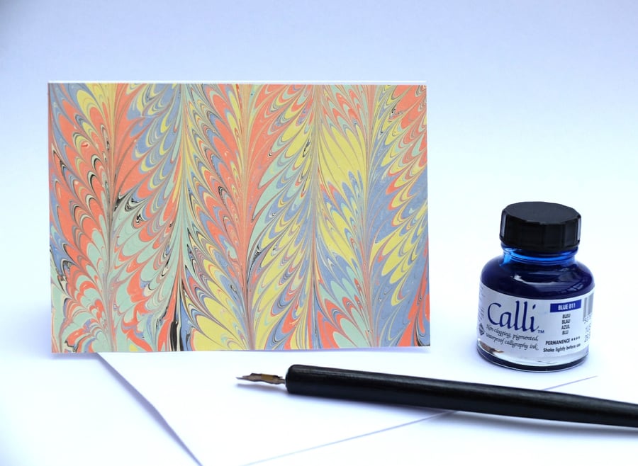 Unusual multicoloured marbled greeting card feather pattern
