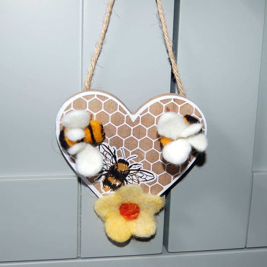 Hanging heart decorated with needle felted bees and flower