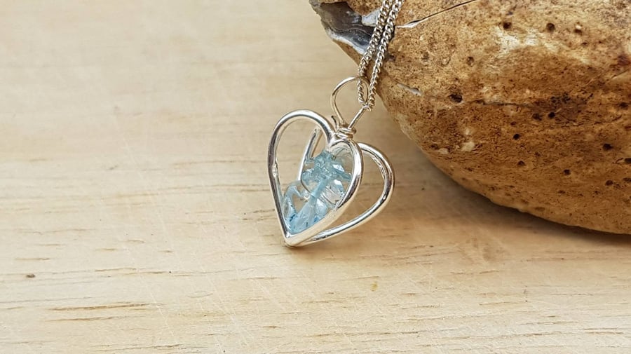 Blue Topaz heart pendant. November birthstone. Sterling silver