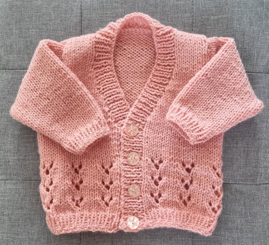 0 to 3 months hand knitted baby cardigan in Peach 