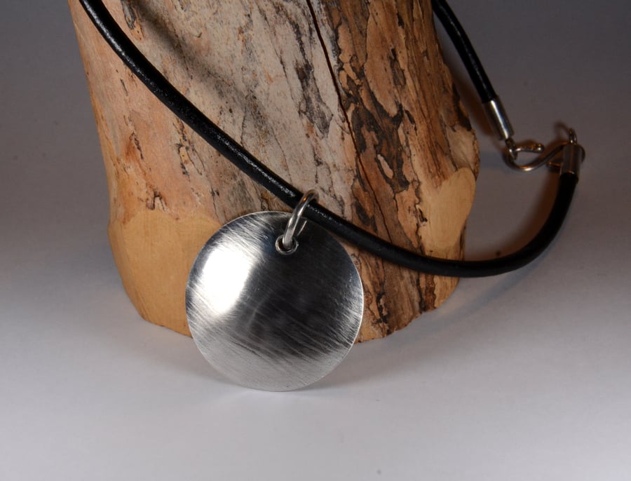 Silver textured circular domed pendant