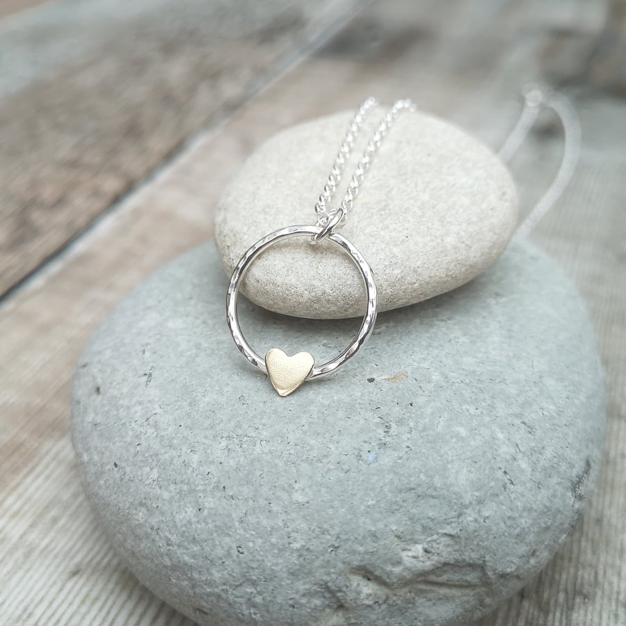 Sterling Silver Hammered Circle Necklace with Gold Heart Detail