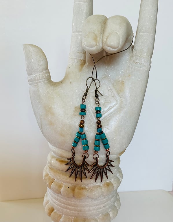 Turquoise and bronze sunburst dangle earrings 