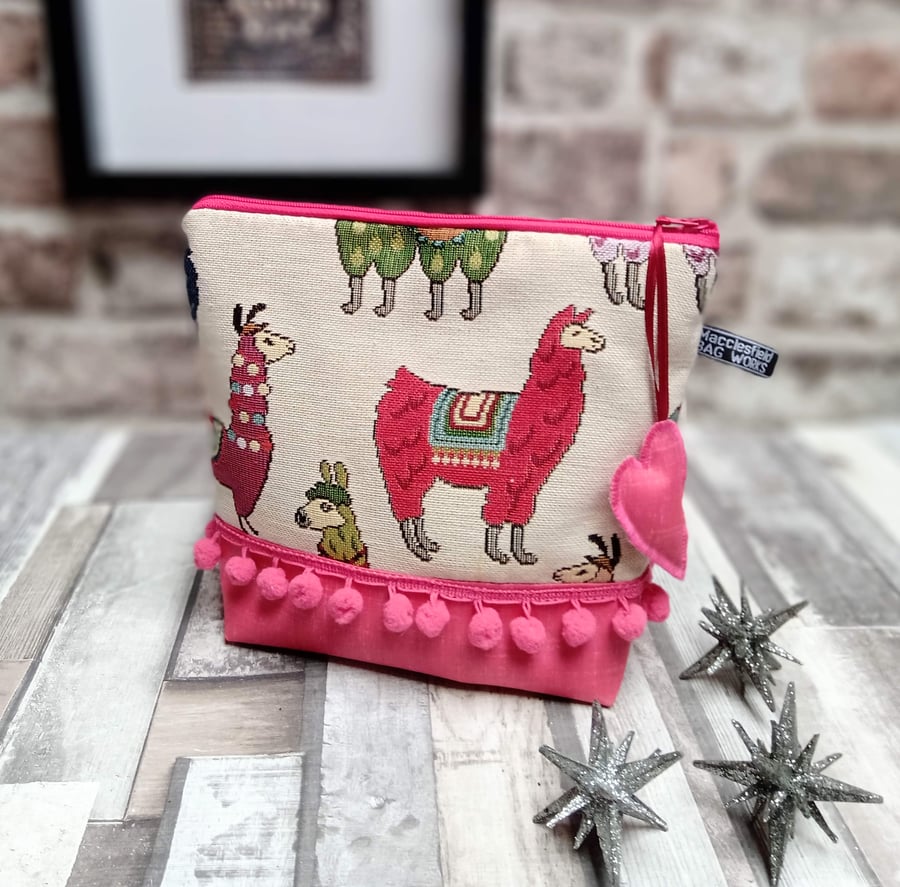 Llamas design tapestry and 'oilcloth' makeup bag.