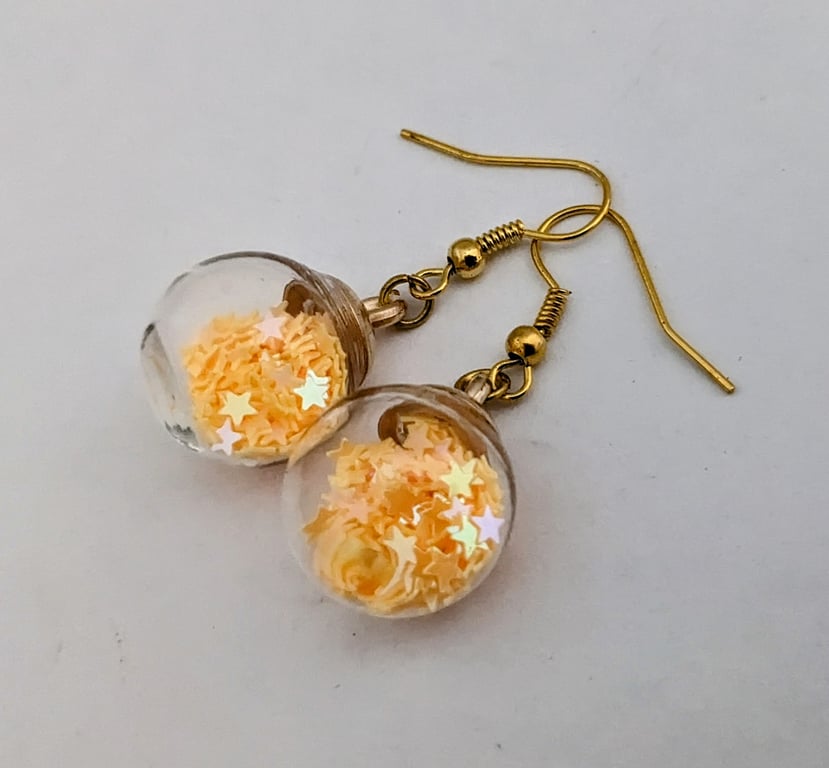 Glass Christmas bauble earrings - pale orange stars