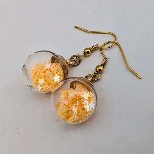 Glass Christmas bauble earrings - pale orange stars