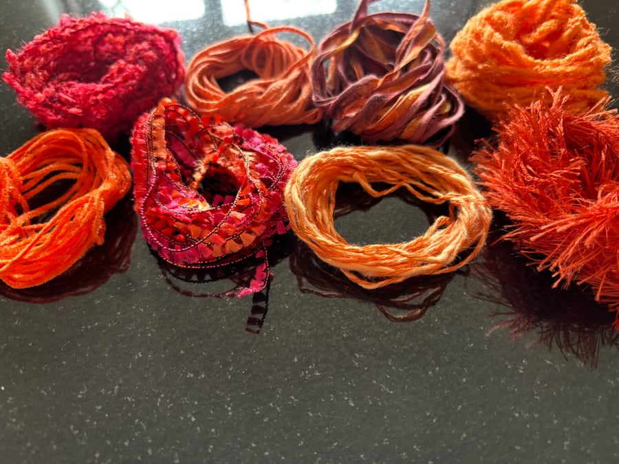 8 bundles of 3 metre lengths textured yarns 