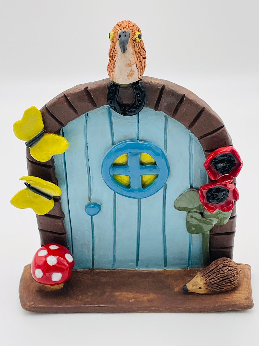 Magical fairy door with poppies & sunshine yellow butterflies