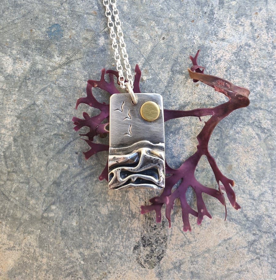 Silver beach, sea coast pendant, with sun and seagulls