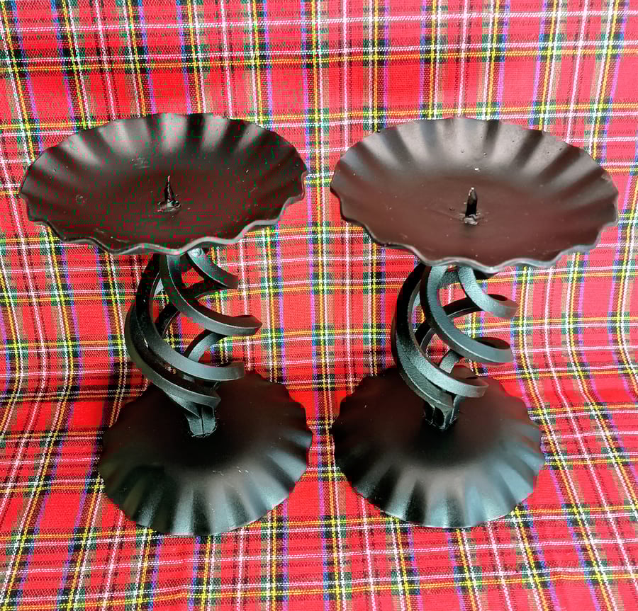 A pair of tall blacksmith-made candlesticks in Baronial style. 