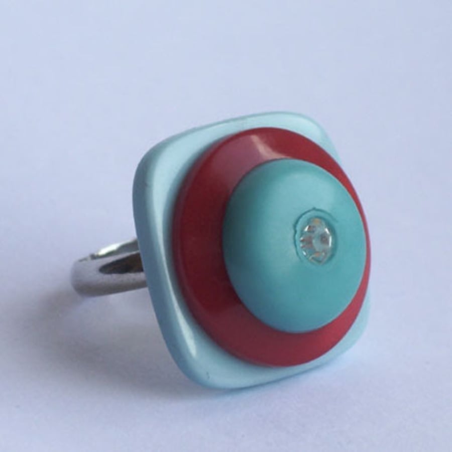 Red and turquoise button, silver tone ring with diamante centre