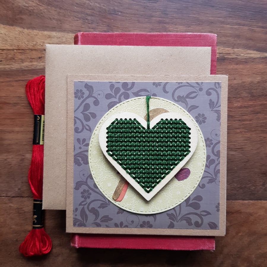 Dark green Christmas decoration with robin card