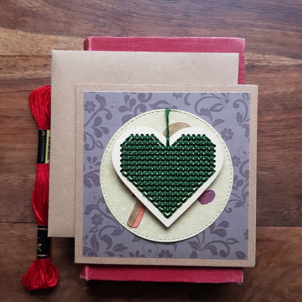 Dark green Christmas decoration with robin card