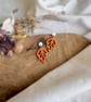 Autumn Minimalist Cutout Metallic Orange Polymer Clay Leaf Earrings - Image 4